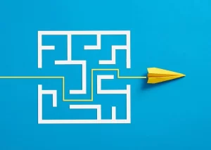 Exit strategy | Blue background with a white drawn maze, a paper airplane is flying out of the maze to the right.