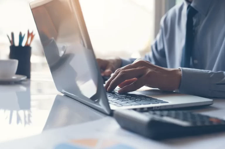 Accountants Hertfordshire | Person typing on laptop