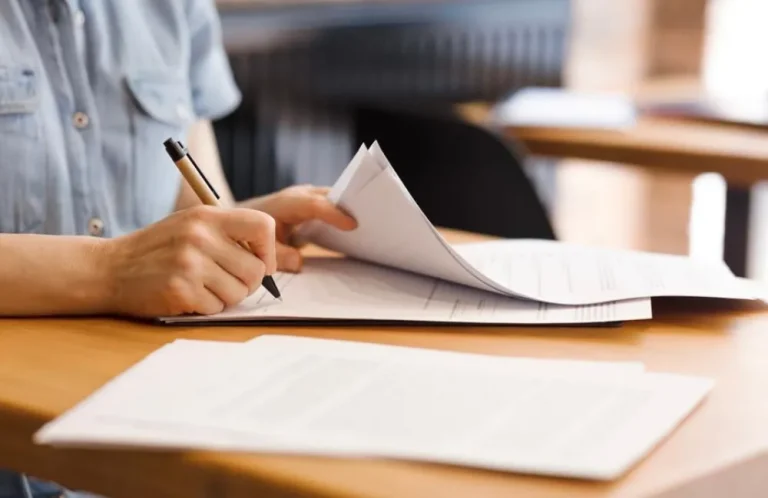 Accountancy Firms Near Me | Person writing on paper